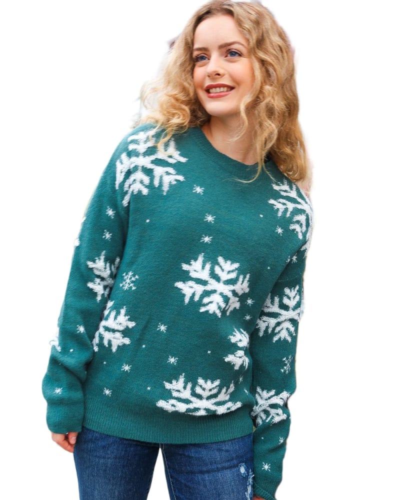 Front of a model wearing a size 3x Season Greetings Hunter Green Puffy Snowflake Jacquard Sweater in Green by Très Chic. | dia_product_style_image_id:321823